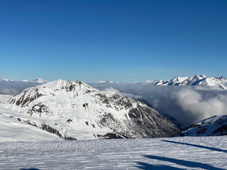 1 Start auf dem Piz Martegnas über den Wolken